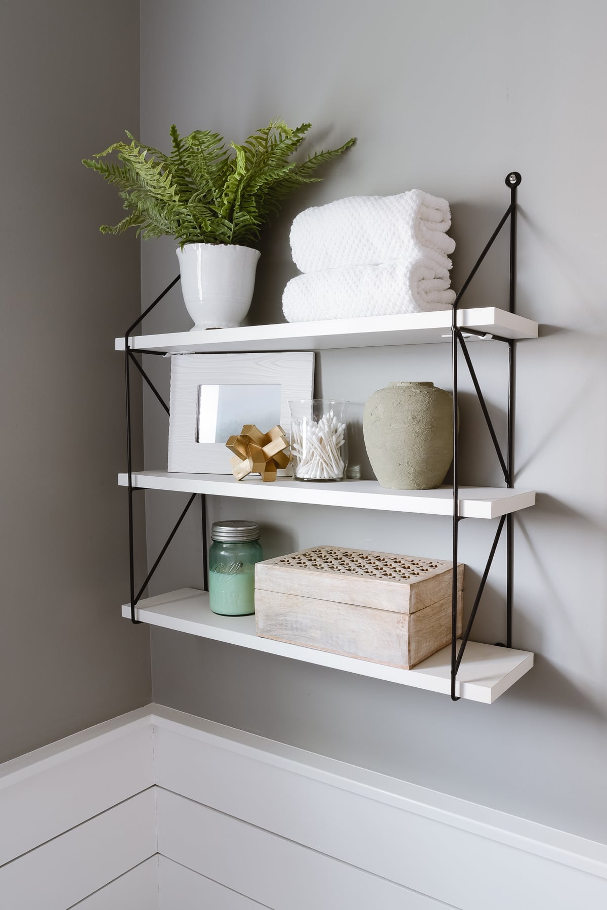 decorative shelf with linen storage