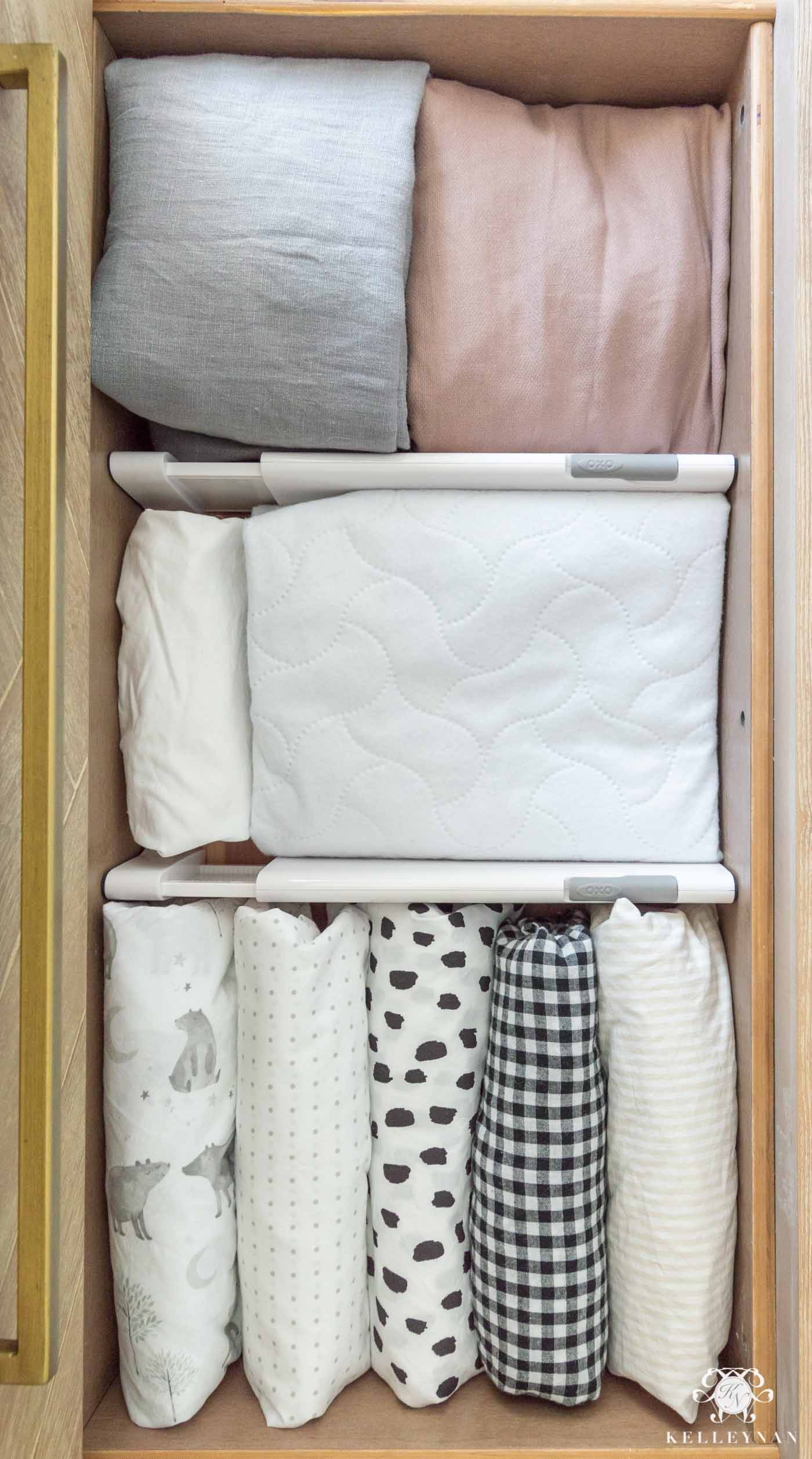 nursery drawer organized bedding and linens