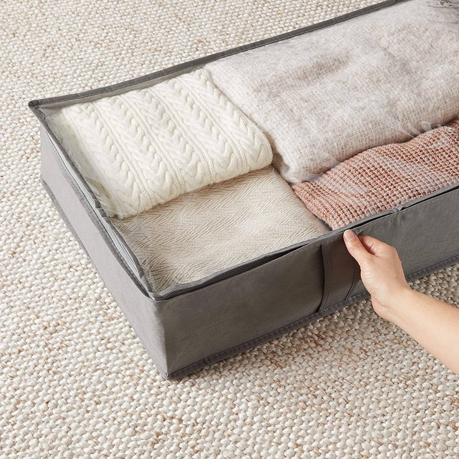 fabric under the bed storage container with stored linens