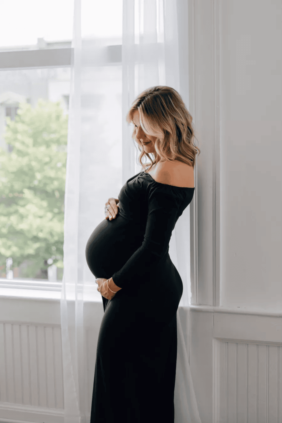 10 Best Maternity Photoshoot Dresses and Gowns | Christene Holder Home